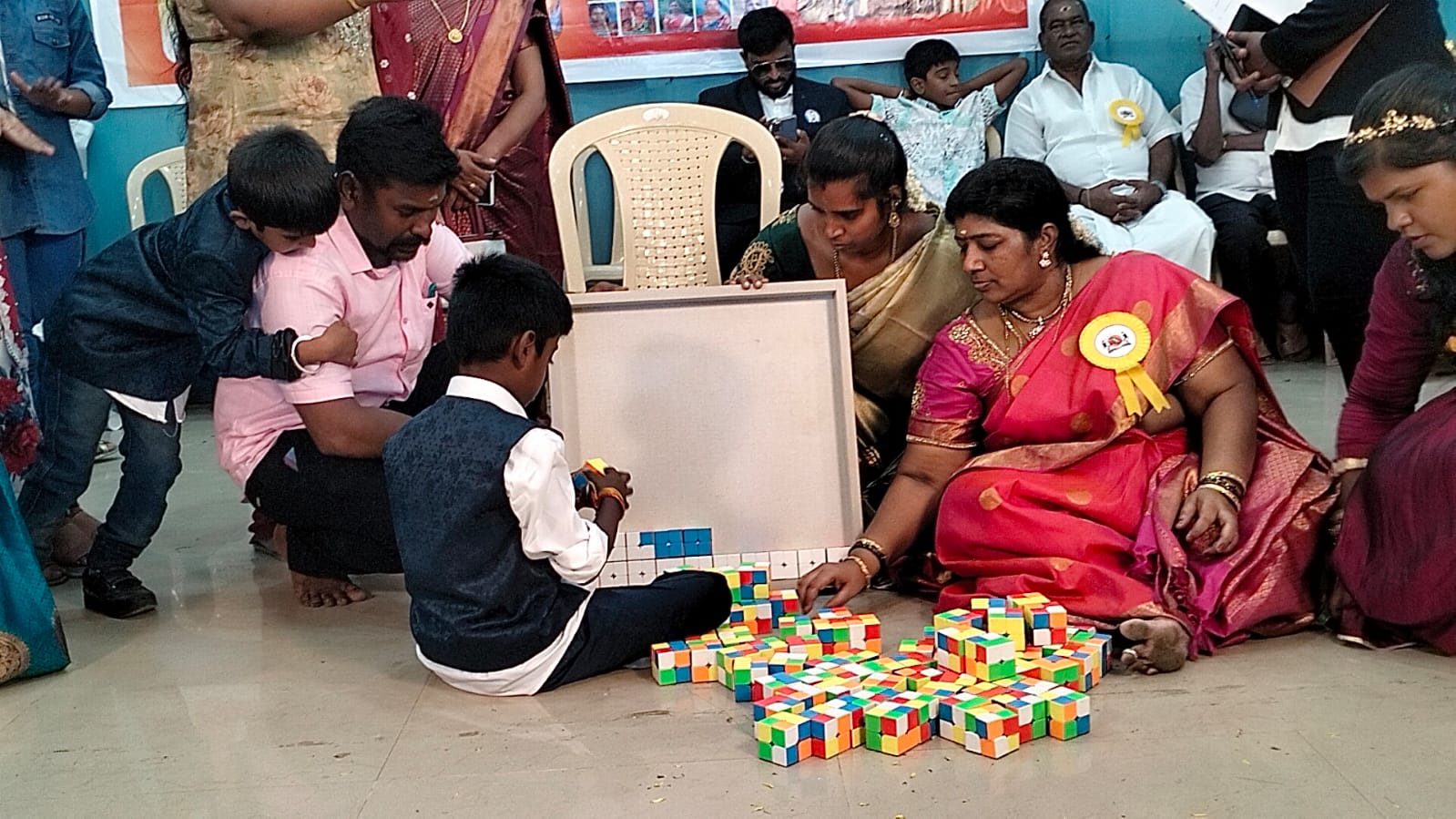 World record by arranging 100 number of 2*2 Rubik's Cube in  the formation of World Peace Logo in least time.